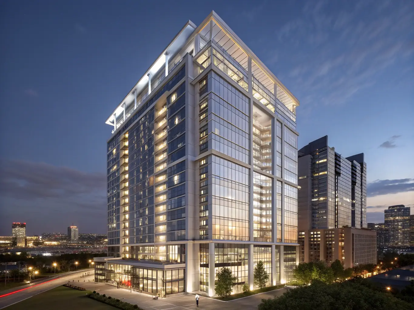 A modern apartment building in Riga, Latvia, representing real estate investment opportunities for the Golden Visa program. The image should convey luxury and stability.